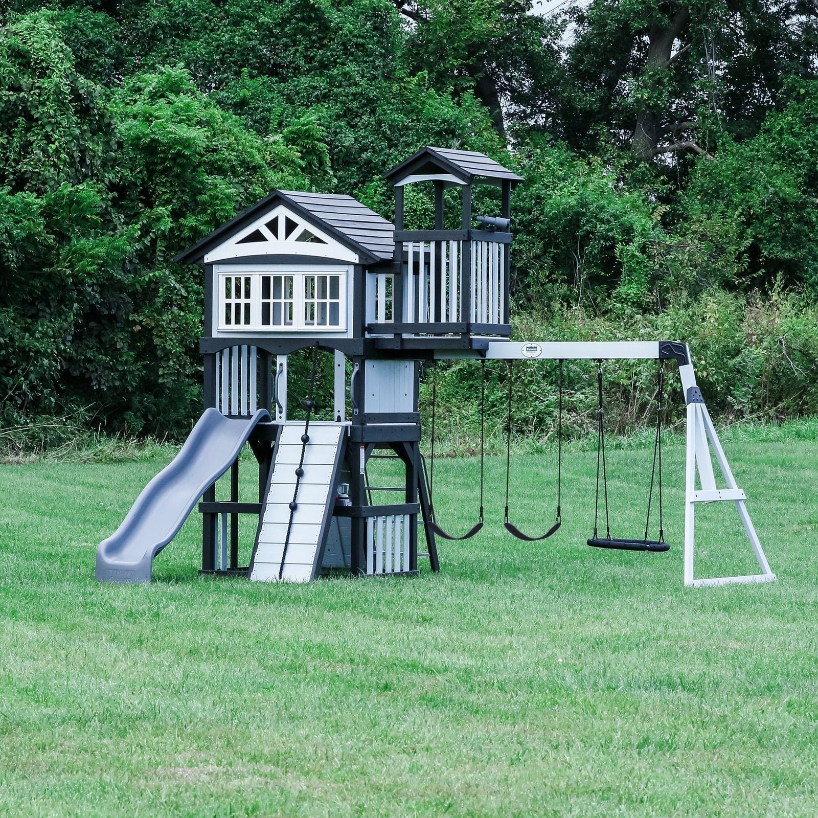 2300262-WHISPERING-HERO.jpg Whispering Point Swing Set - Image 1